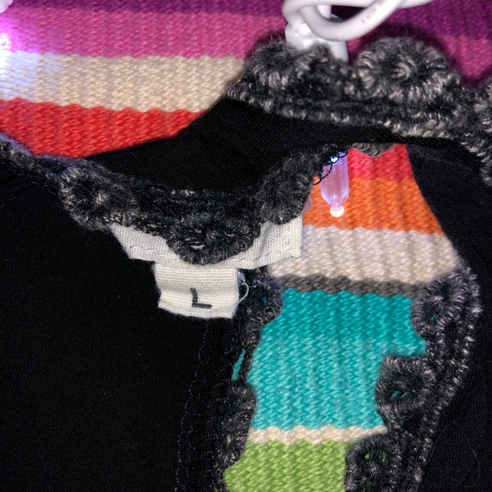 Super cute worn once black tank top with lace!